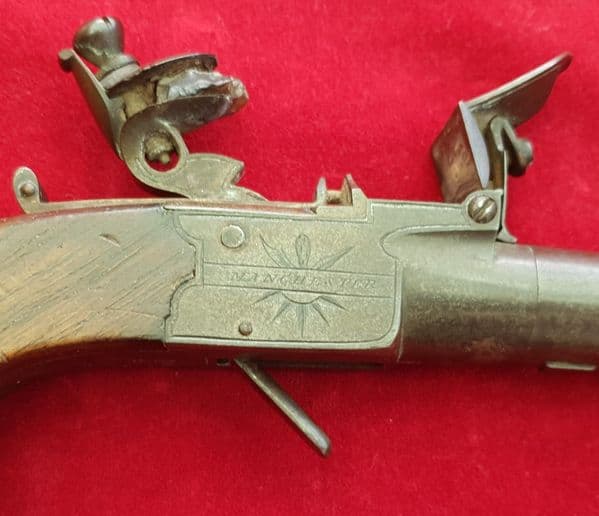 A flintlock pocket pistol with folding trigger by STYAN of Manchester. Circa 1803-1811.  Ref 2139.